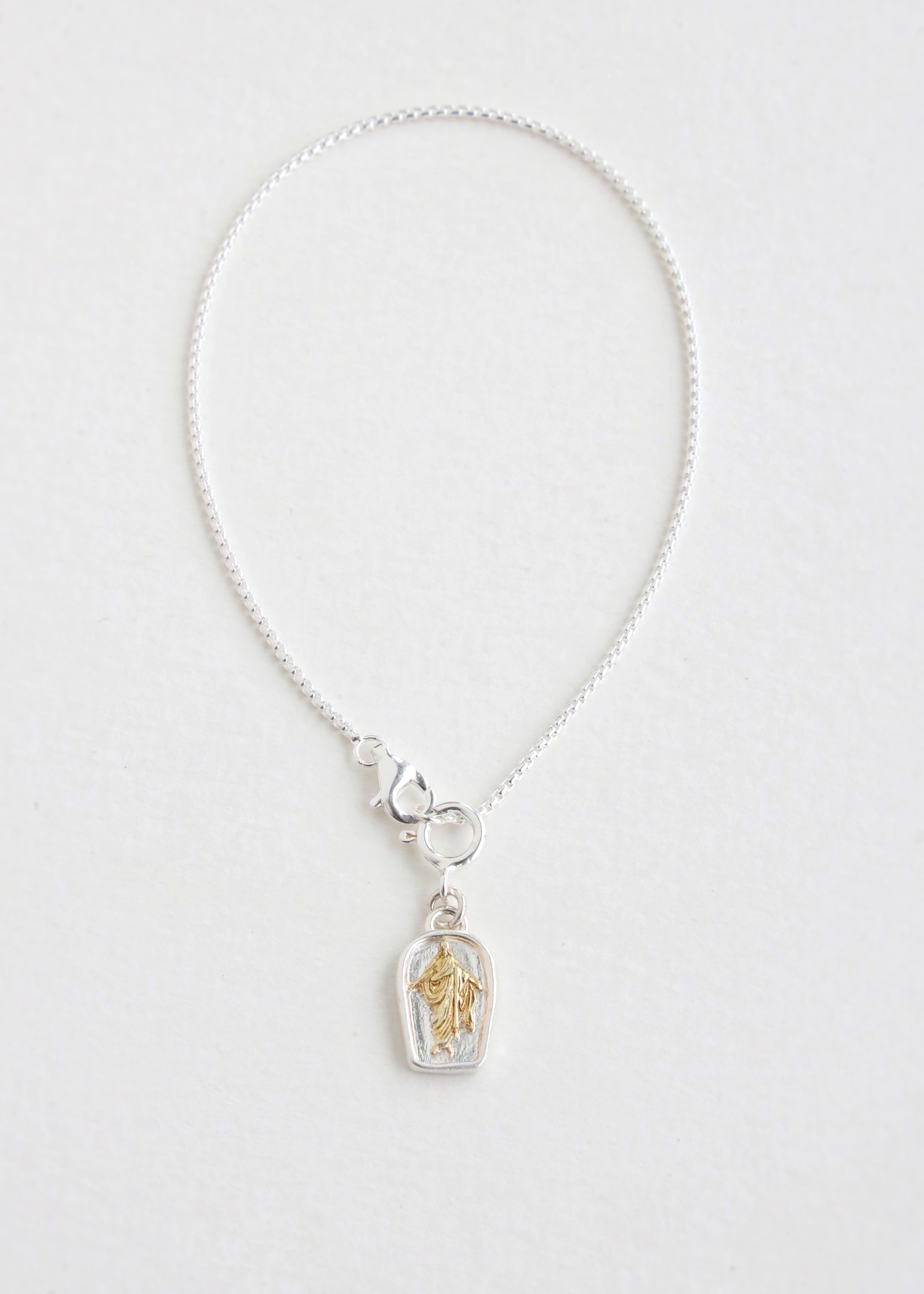 The Savior Charm and Sterling Silver Bracelet